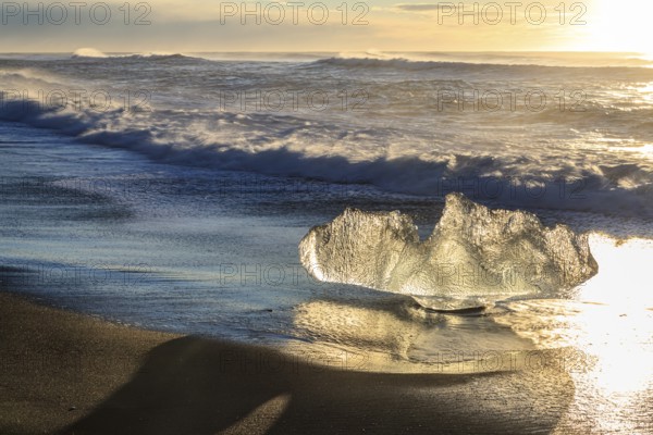Ice floes on the beach, waves, sunny, morning mood, winter, Diamond Beach, Breidamerkursandur,