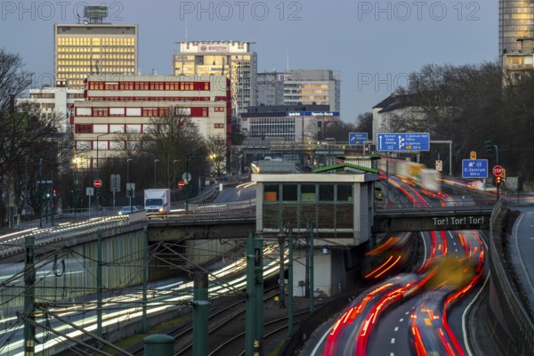 Motorway A40, Ruhr expressway, heavy traffic jam, rush hour, city passage in Essen, skyline of the