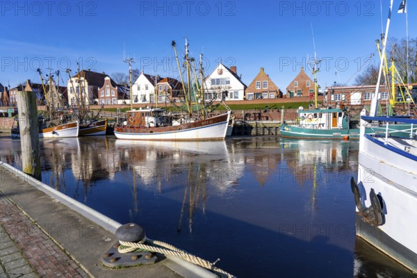 The fishing village of Greetsiel, historic fishing harbour, with the largest shrimp cutter fleet in