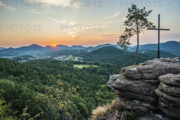 Sandstone rock with pine tree and summit cross, Rötzenfelsen, sunrise, Gossersweiler-Stein,