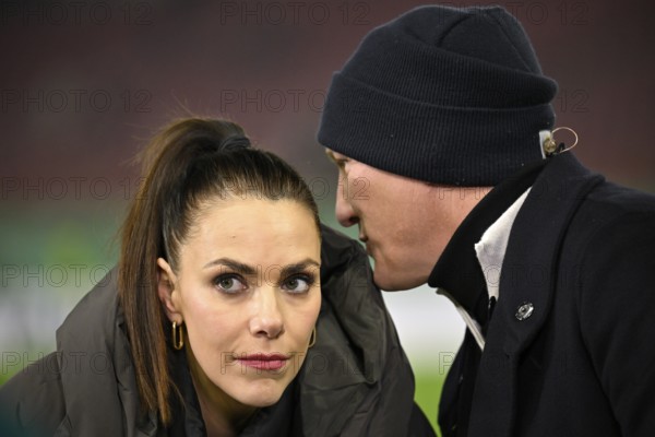 ARD TV pundit Bastian Schweinsteiger, cap, portrait in conversation with presenter Esther Sedlaczek