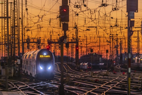 Track apron with trains, rails, points, pylons and signalling systems. Infrastructure at the main