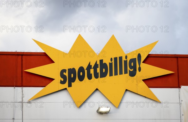 Mülheim, North Rhine-Westphalia, Germany - mock-cheap, lettering on the facade of a speciality