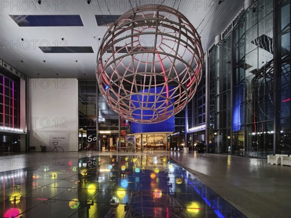 Entrance hall with lattice globe in the evening, Autostadt, Volkswagen AG, Wolfsburg, Lower Saxony,