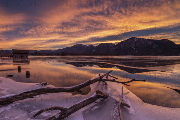 Dawn, mountains reflected in lake, clouds, ice, frozen, winter, Lake Kochel, view of Rabenkopf,