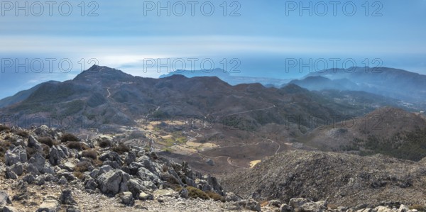 View from the summit of Kali Limno over the rocky mountain landscape of southern Karpathos with the