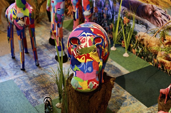 Animal figures made from washed-up sandals and flip-flops by African artists, Flora Maritime and