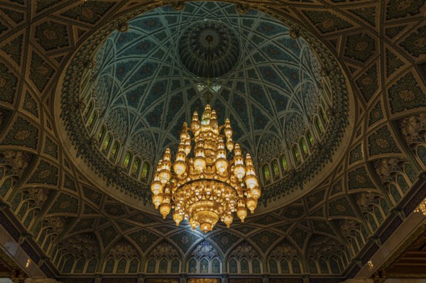 Dome and illuminated chandelier in the Sultan Qaboos Mosque, Muscat, Arabian Peninsula, Sultanate