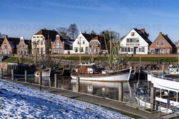 The fishing village of Greetsiel, historic fishing harbour, with the largest shrimp cutter fleet in