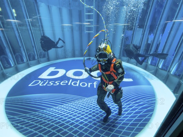 Diver helmet diver from the German Navy with hose for air supply from outside the water during