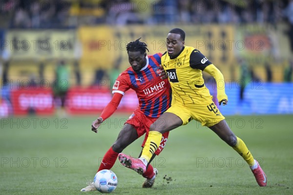 Duel, action Jamie Bynoe-Gittens Borussia Dortmund BVB (43) against Omar Haktab Traore 1. FC