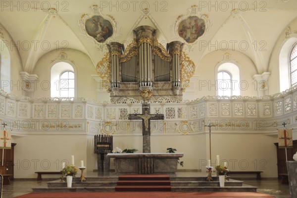 Interior view of the town church of St Symphorian, altar and organ on the gallery, Zell am