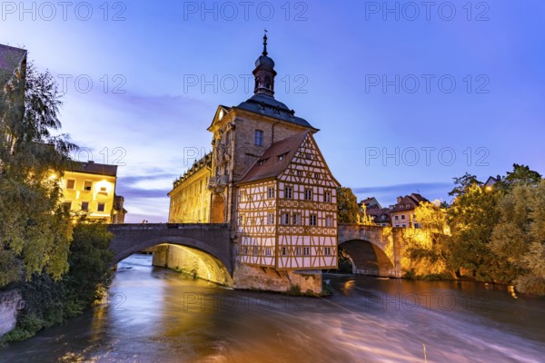 The Old Town Hall in the river Regnitz at dusk, Old Town of Bamberg, Upper Franconia, Bavaria,