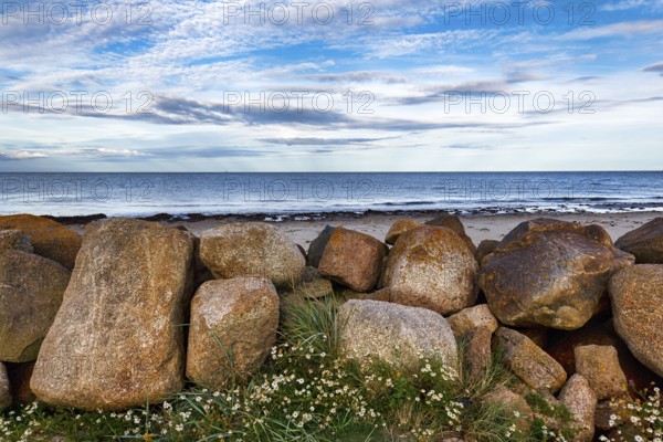 Coastal defence, boulders overlooking the sea, dusk, Carne Beach, Wexford, Gerrans Bay, Roseland
