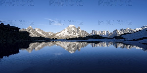 Mountain landscape in the evening light, water reflection in Lac Blanc, mountain peak, Aiguille