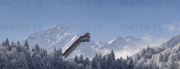 Mountain panorama over the Freibergsee in winter, near Oberstdorf, behind the Heini-Klopfer ski