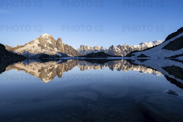 Mountain landscape in the evening light, water reflection in Lac Blanc, mountain peak, Aiguille
