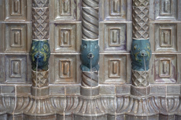 Art Nouveau ceramic fountain made of majolica tiles in the fountain house, detail, Kissingen spa,