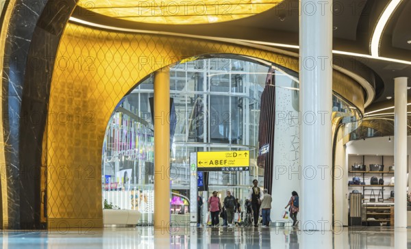 Abu Dhabi Airport, Zayed International Airport with passengers. Duty free shop. The new Terminal A