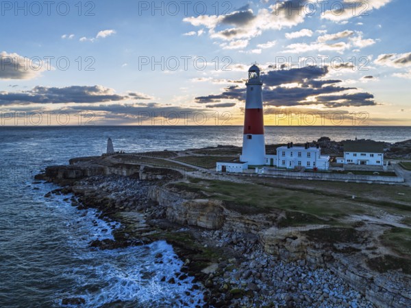 Sunset over Portland Bill Lighthouse from a drone, Portland Bill, Isle of Portland, Dorset,