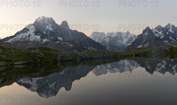 Dusk at the Lacs des Chéserys mountain lake in the Aiguilles Rouges nature reserve, with the