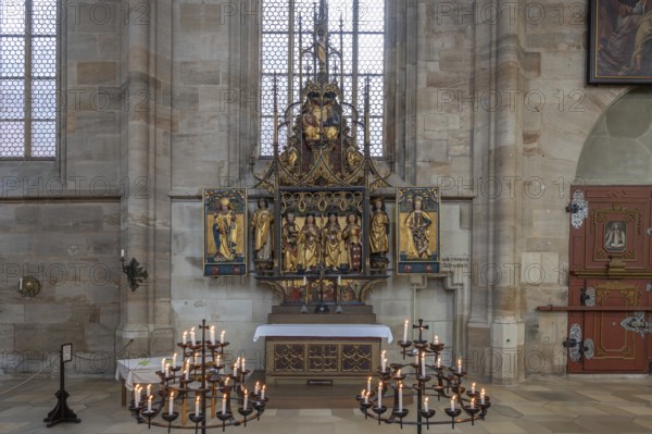 Trinity altar from 1470 in the late Gothic hall church of St George, Dinkelsbühl, Bavaria, Germany,