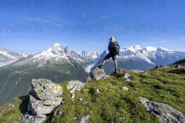 Mountaineers in front of a mountain panorama, mountain peaks Aiguille Verte, Grandes Jorasses and