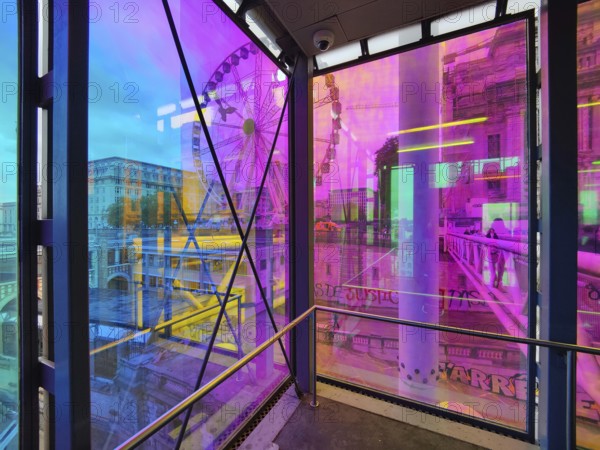 Marollescenece, art installation The Cube, coating of the windows with translucent dichroic films,