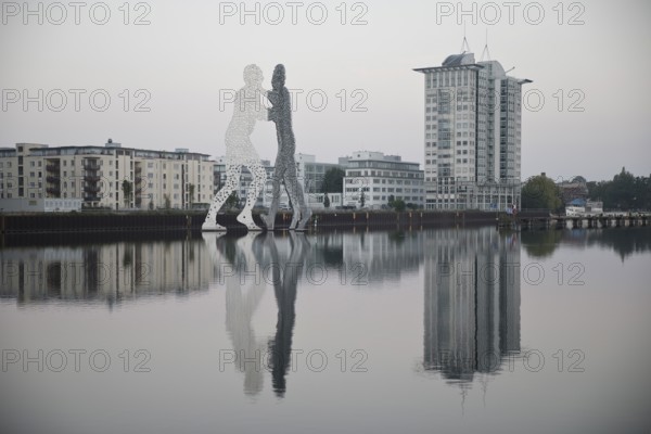 Molecule Man, monumental artwork in the Spree with the Twin Towers Treptow, artist Jonathan