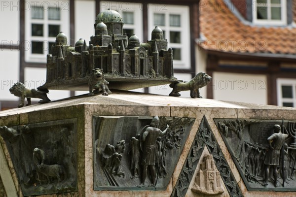 Bronze sculpture with a miniature of the city of Jerusalem on the ashlar of the synagogue memorial,