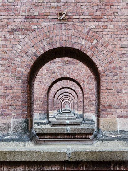 Detail of the Göltzschtal Bridge, view through the bridge arches, largest brick bridge in the