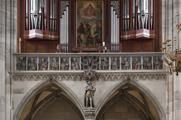 Sculptures of the twelve apostles on the organ loft of the late Gothic church of St George,