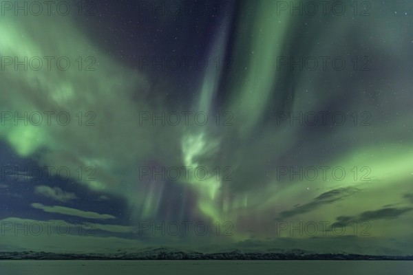 Northern Lights, Aurora borealis, frozen lake, mountains, winter, Torneträsk, Laponia, Lapland,