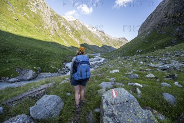 Mountaineer on hiking trail, Umbaltal, Venediger Group, Hohe Tauern National Park, East Tyrol,