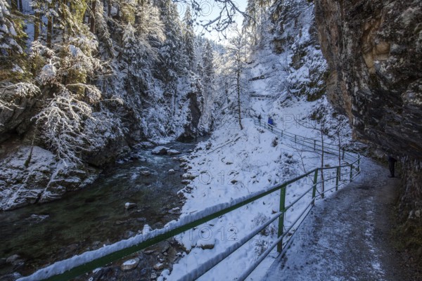 Winter, snowy landscape, river Breitach and hiking trail through the Breitachklamm gorge near