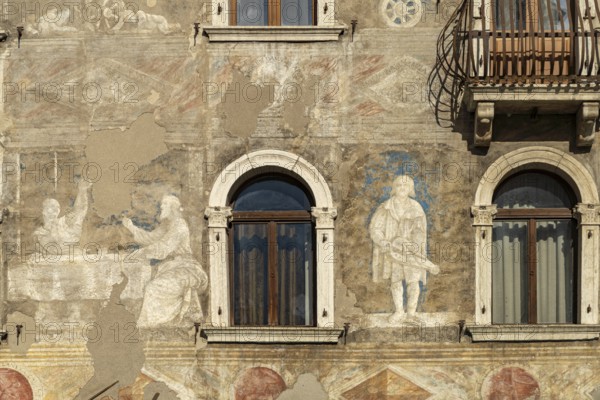 The painted façade of the Case Cazuffi Rella houses on Piazza del Duomo in Trento, Trentino, Italy,