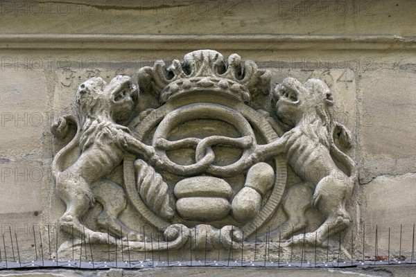 Relief of an old baker's sign on a former mill, Egloffstein, Upper Franconia, Bavaria, Germany,