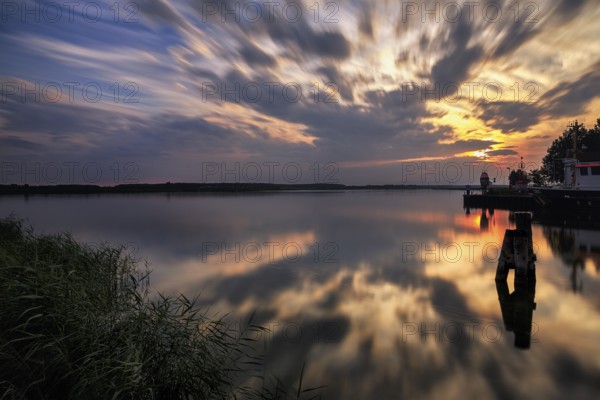 Harbour entrance at the Peenestrom, sunset, backlight, long exposure, marina, fishing port