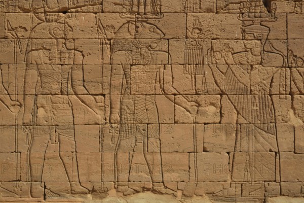 Relief of a procession with the deities Apedemak and Horus at the Lion Temple for the lion-deity