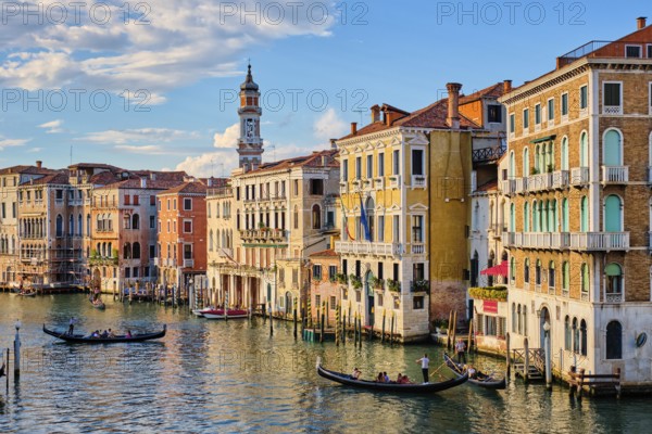 VENICE, ITALY, JUNE 27, 2018: Grand Canal with boats and gondolas on sunset, Venice, Italy, Europe