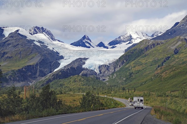 Snow-capped mountains and glaciers, highway with camper, autumn, Valdez, Richardson Highway,