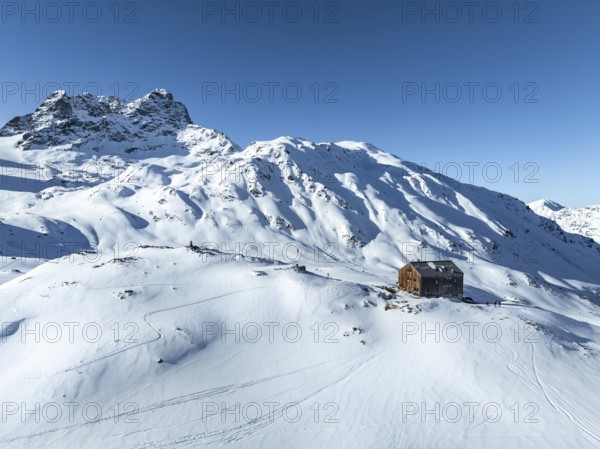 Alpine panorama, aerial view with Kesch hut, Alpine Club hut of the SAC in winter, Albula Alps,