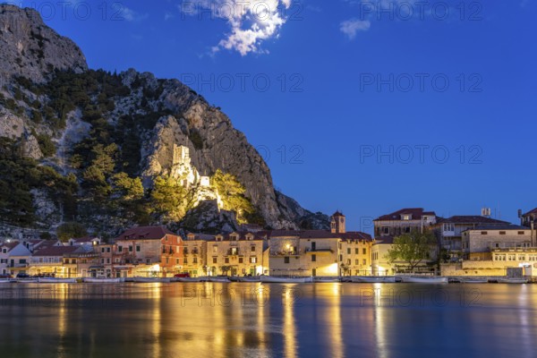 The old town centre of Omis on the river Cetina with the ruins of the Mirabella fortress or Peovica
