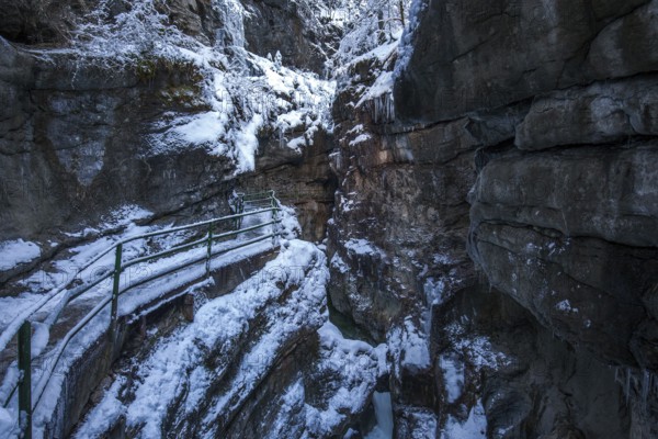 Winter, snowy landscape, river Breitach and hiking trail through the Breitachklamm gorge near
