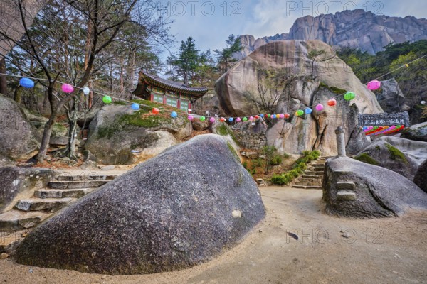 SEORAKSAN, SOUTH KOREA, APRIL 14, 2017: Kyejoam Seokgul Hermitage shrine and Ulsanbawi rock in