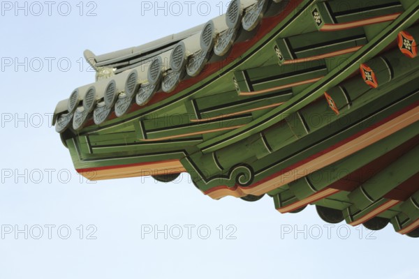 Detail on the roof with decorations from the temple, pavilion plum arbour, wooden construction,