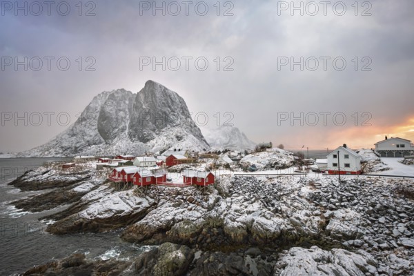 Famous tourist attraction Hamnoy fishing village on Lofoten Islands, Norway with red rorbu houses.