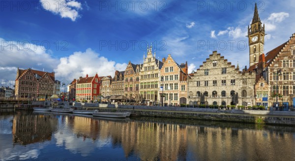Europe Belgium medieval town travel background, panorama of Ghent canal and Graslei street on