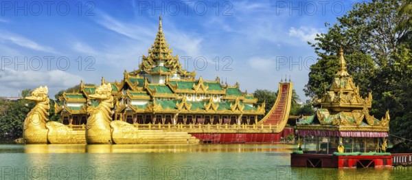 Panorama of Yangon icon landmark and tourist attraction: Karaweik, replica of a Burmese royal barge