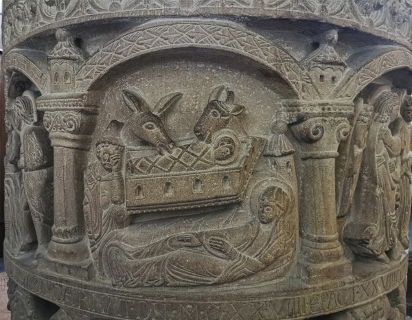 Romanesque baptismal font from 1129 in the former collegiate church of St. Boniface, relief